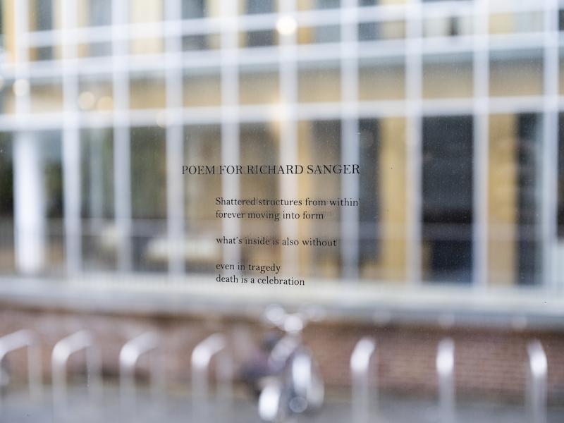 poem printing on the window of a gallery