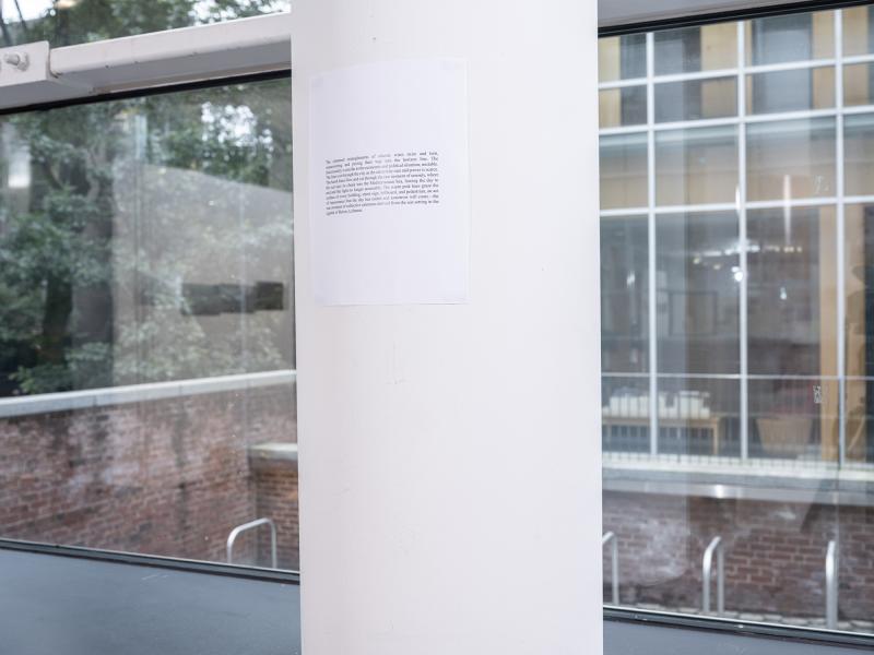 printed text installed on a gallery column