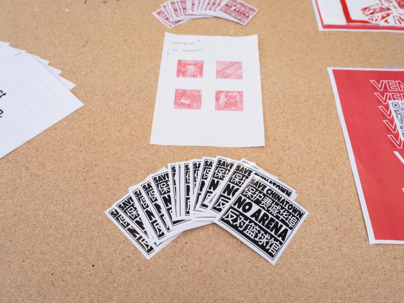 multiple brochures and stickers displayed on a table
