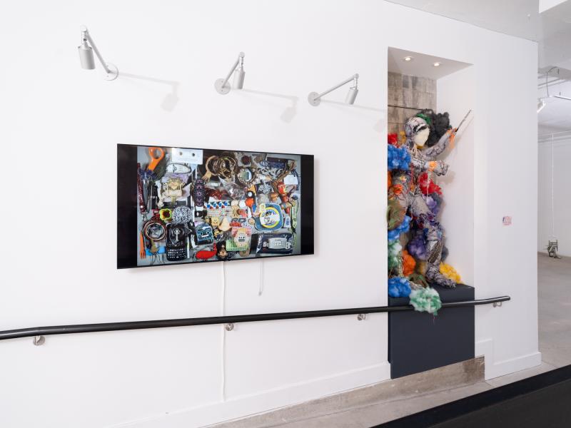 wall mounted animation and large figurative sculpture