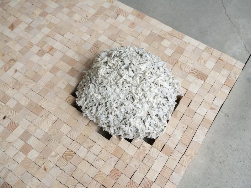 floor sculpture using clay and wood