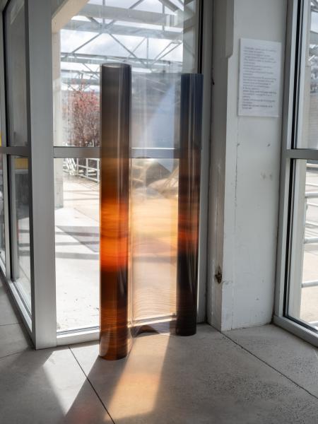 image of a freestanding sculpture in front of a gallery window