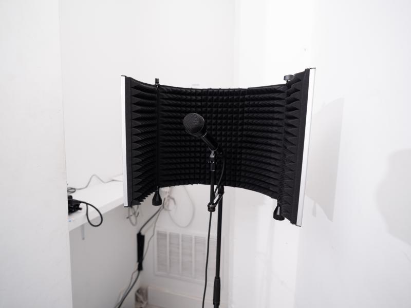 detail image of a microphone on a stand in a gallery