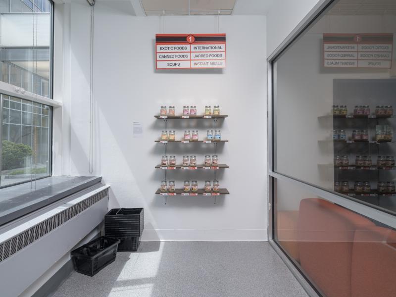 installation of shelving with multiple food items on display