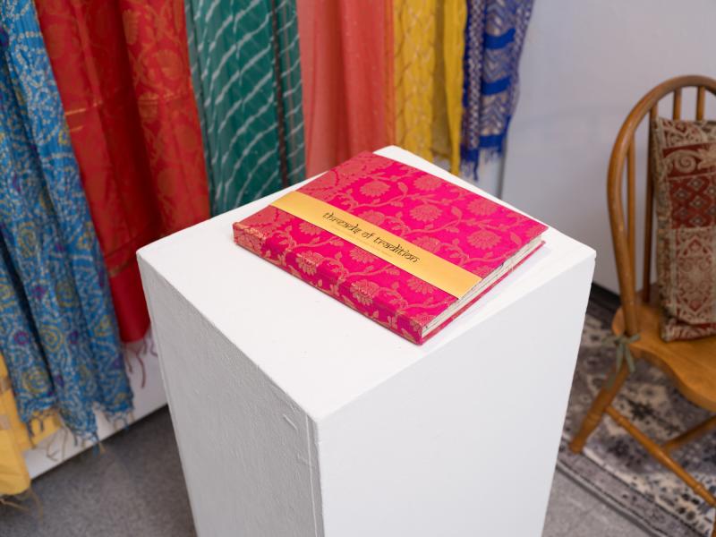 detail image of a book on a pedestal