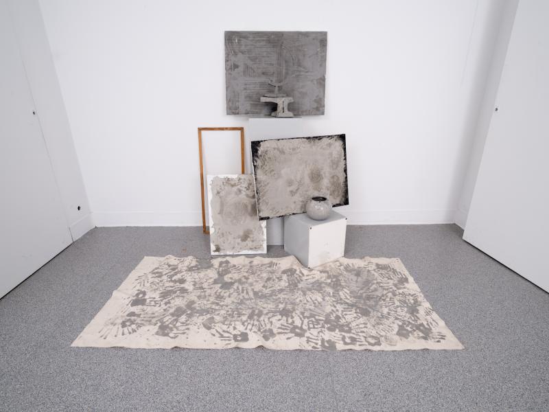 mixed media installation installed on the wall and floor of a gallery