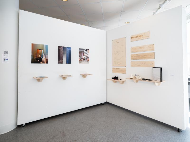 two mixed media installations installed on walls of a gallery