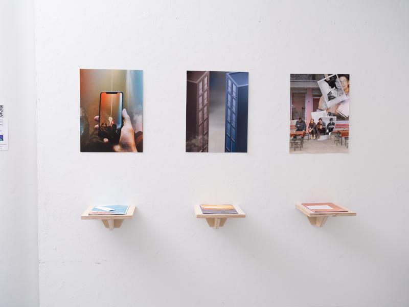 mixed media installation using digital photographs and books installed on shelves
