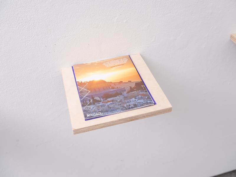 detail of a book installed on a shelf