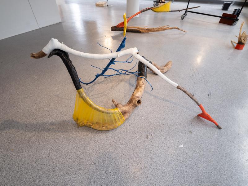multiple floor sculptures installed on a gallery floor