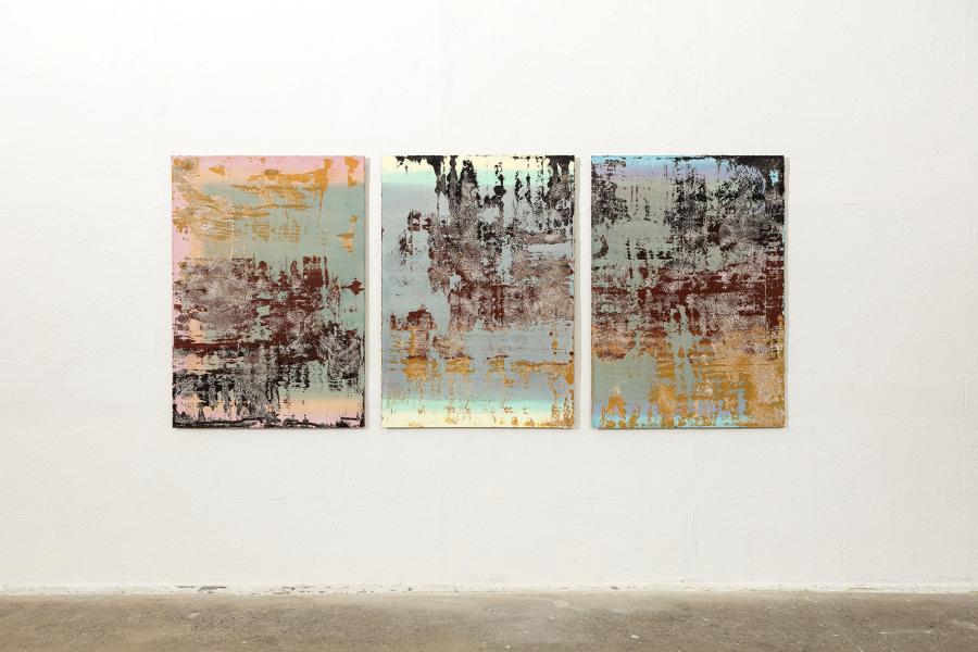 Three paintings resembling rust build up on reflective service