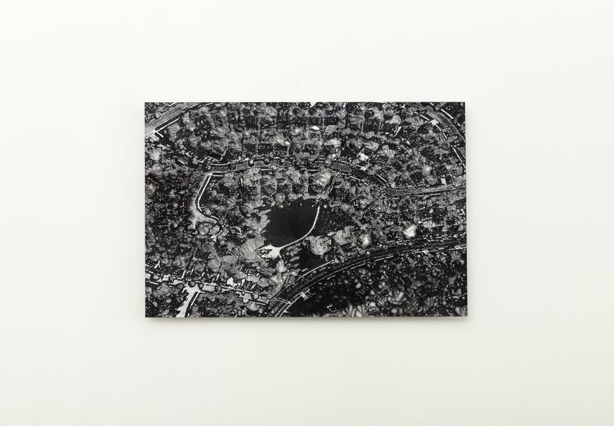 image of a black and white aerial photograph printed on aluminum of a suburban neighborhood 