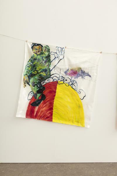image of a painting on silk suspended on a thin cord