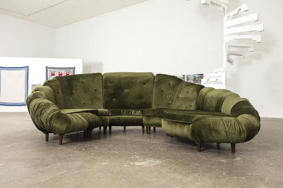 Wide shot of couch in gallery