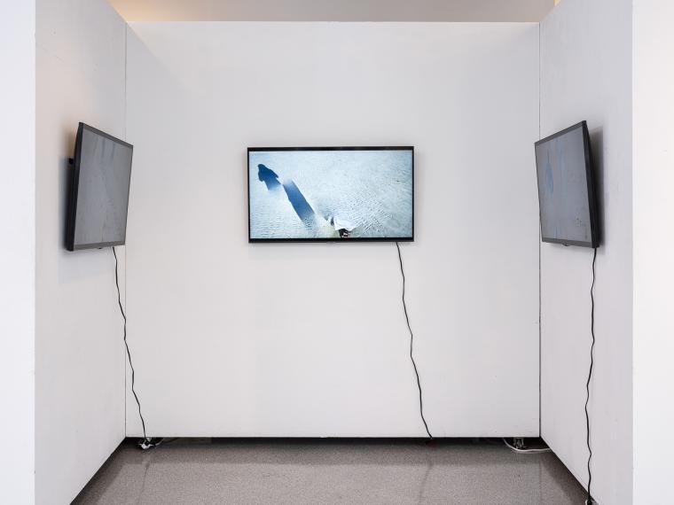 video installation using three monitors on three gallery walls 