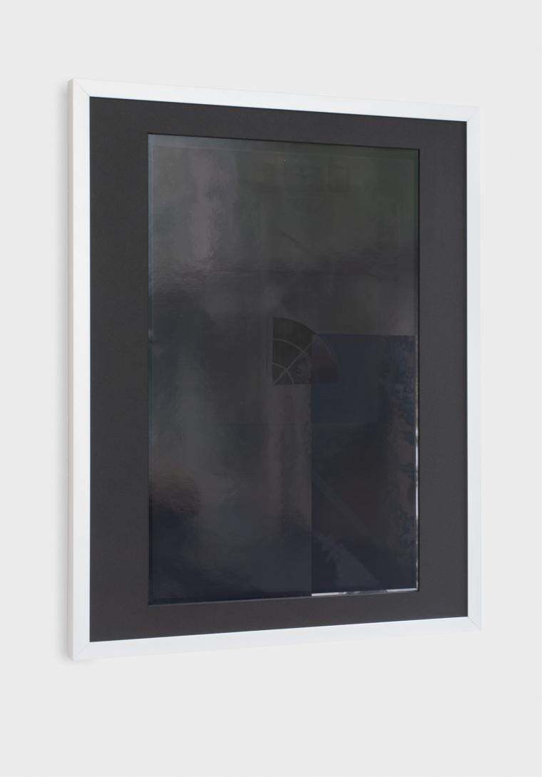 image of a photographic print installed on a gallery wall