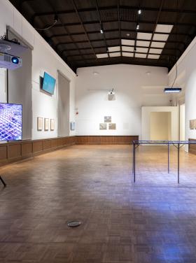 installation image of multiple wall and floor pieces installed in a gallery